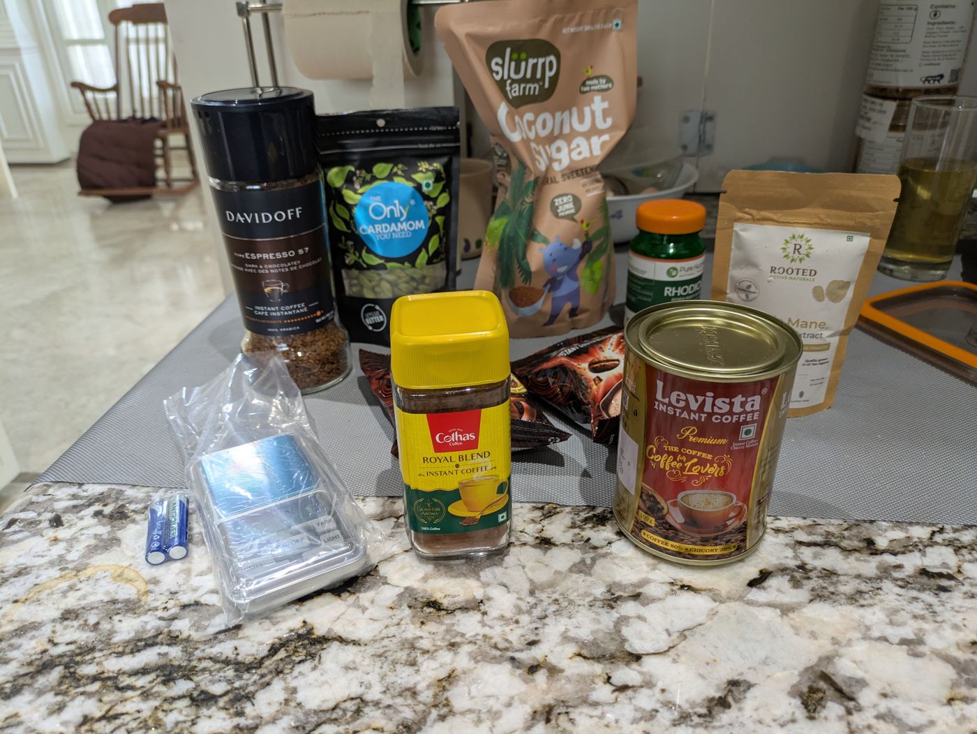 A messy kitchen counter mid-experiment