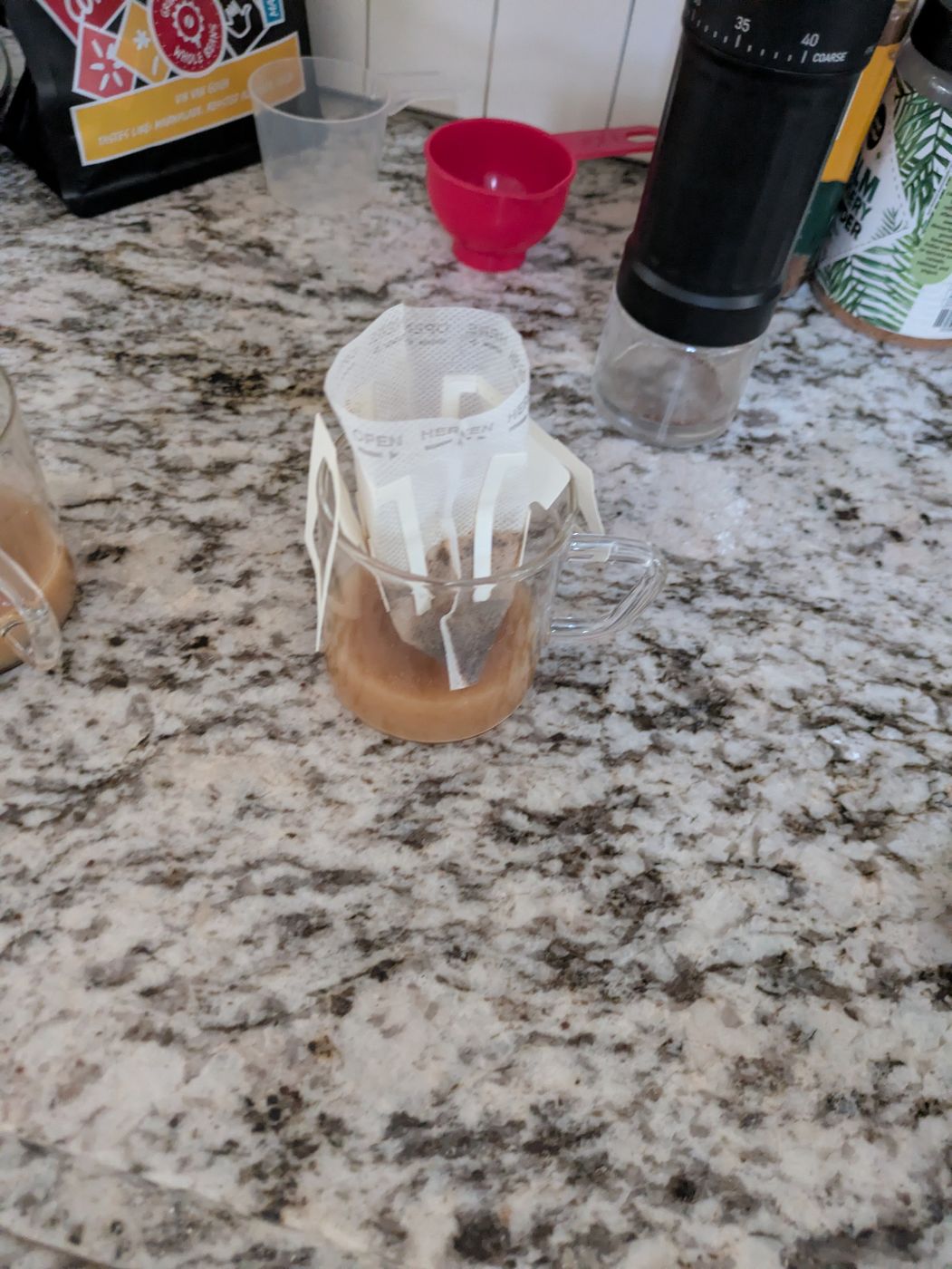 A filter sachet steeping in a glass